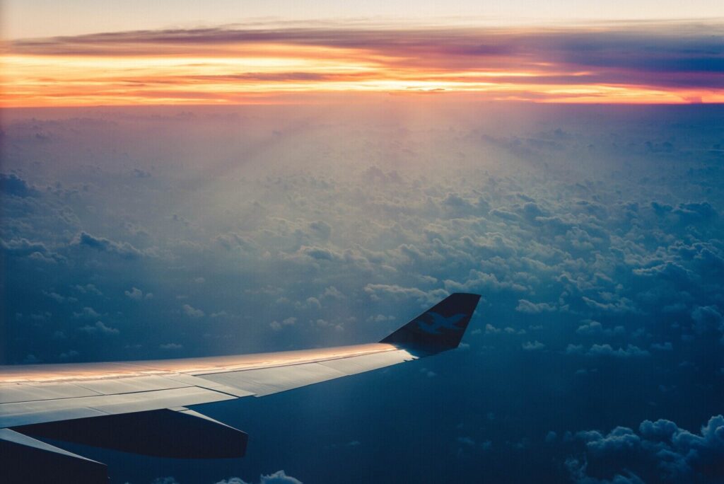 plane flying in clouds
