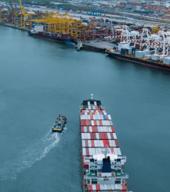 Container ship at port terminal for ocean export
