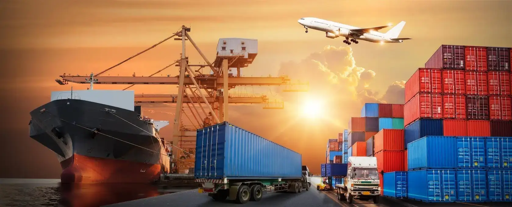 Container ship, cargo trucks, stacked shipping containers, and a cargo plane at sunset, illustrating Jade International's different modes of freight forwarding service by air, ocean, and ground.